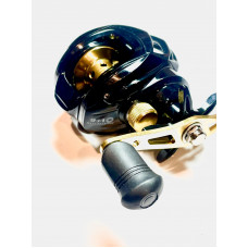 Miracle Fish multiplikatora spole AK Right melna+zelta krāsa.